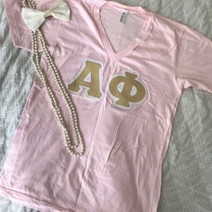 Pink and gold Alpha Phi letter shirt